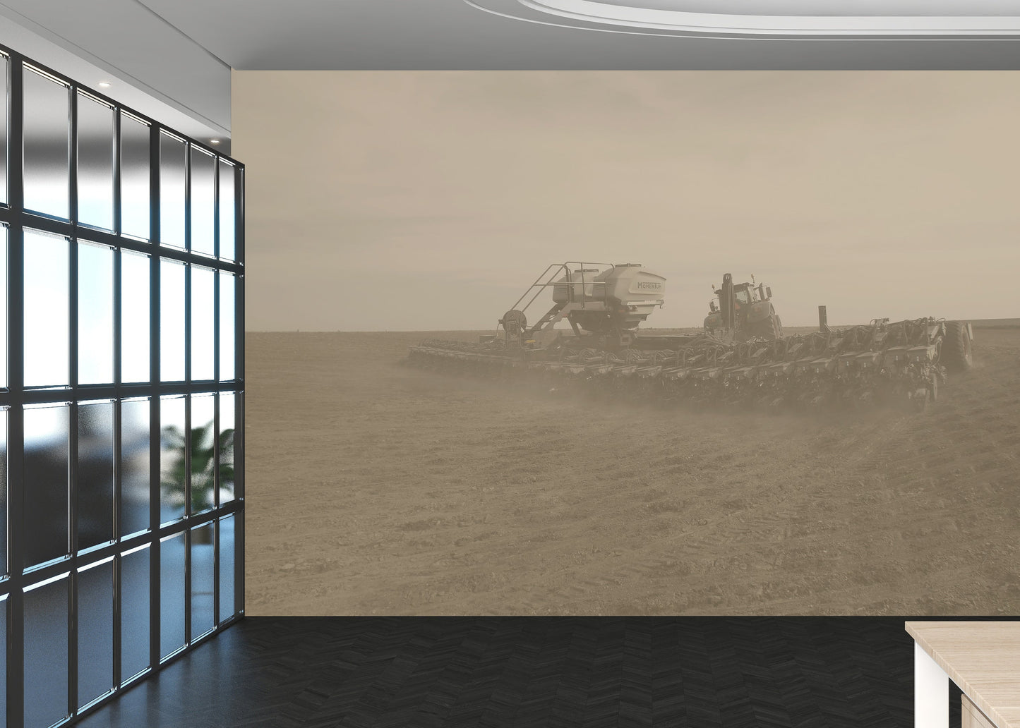 Wall mural of a plowed field with a tractor in an office setting